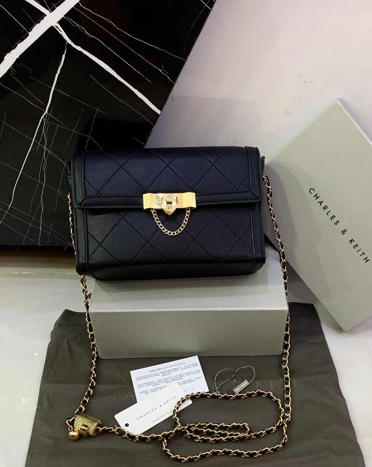Charles & Keith Tallulah Quilted Push Lock Clutch
