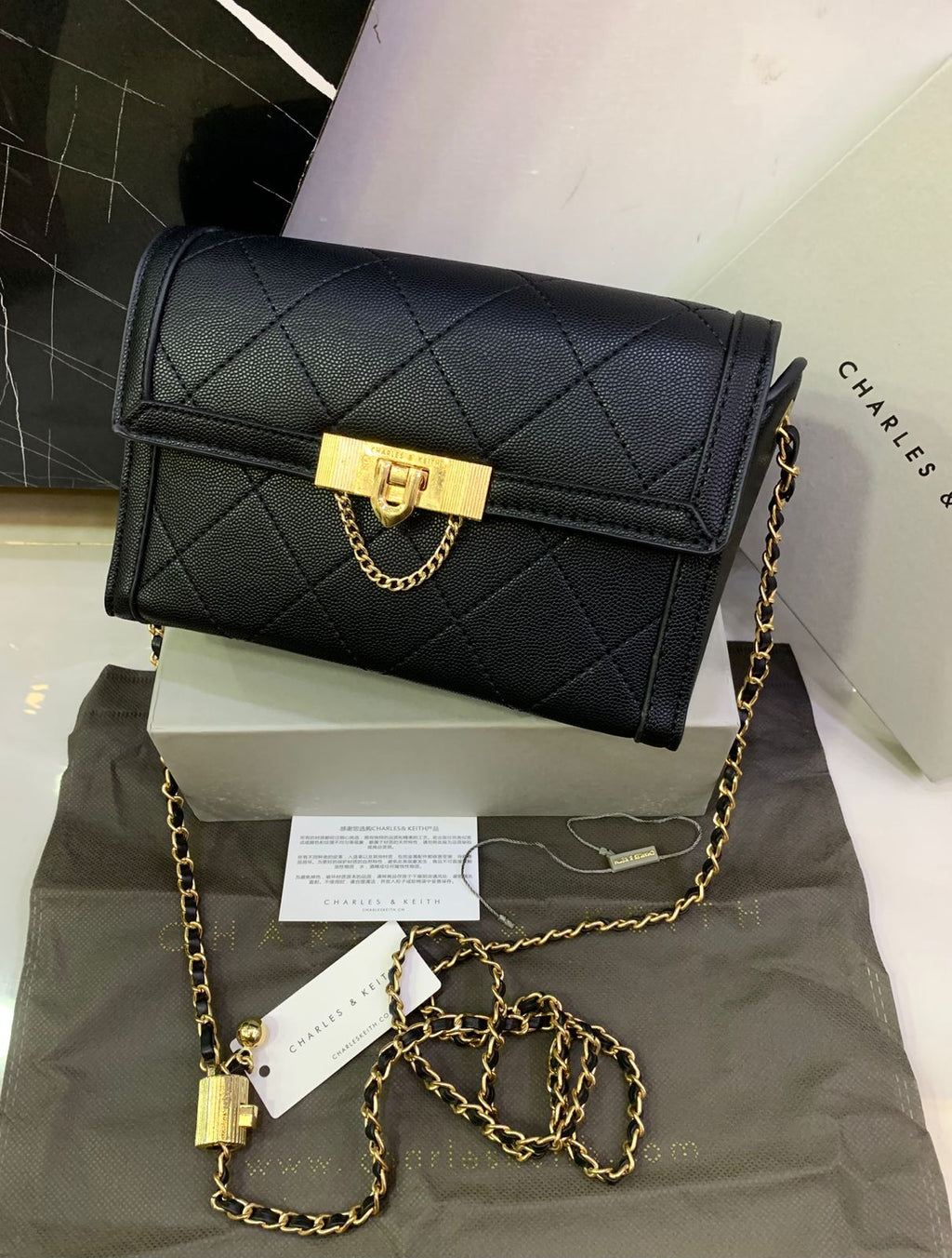 Charles & Keith Tallulah Quilted Push Lock Clutch
