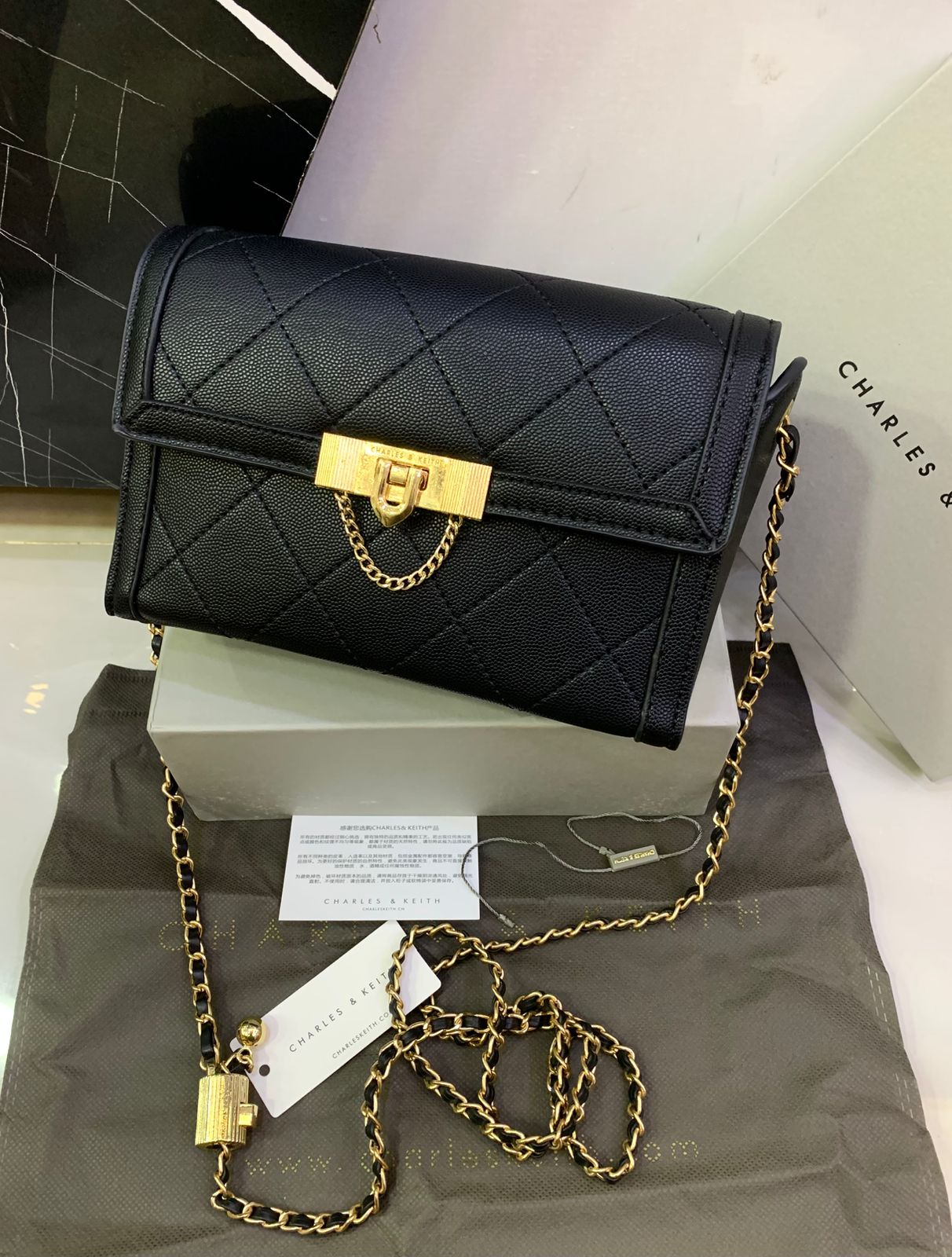 Charles & Keith Tallulah Quilted Push Lock Clutch